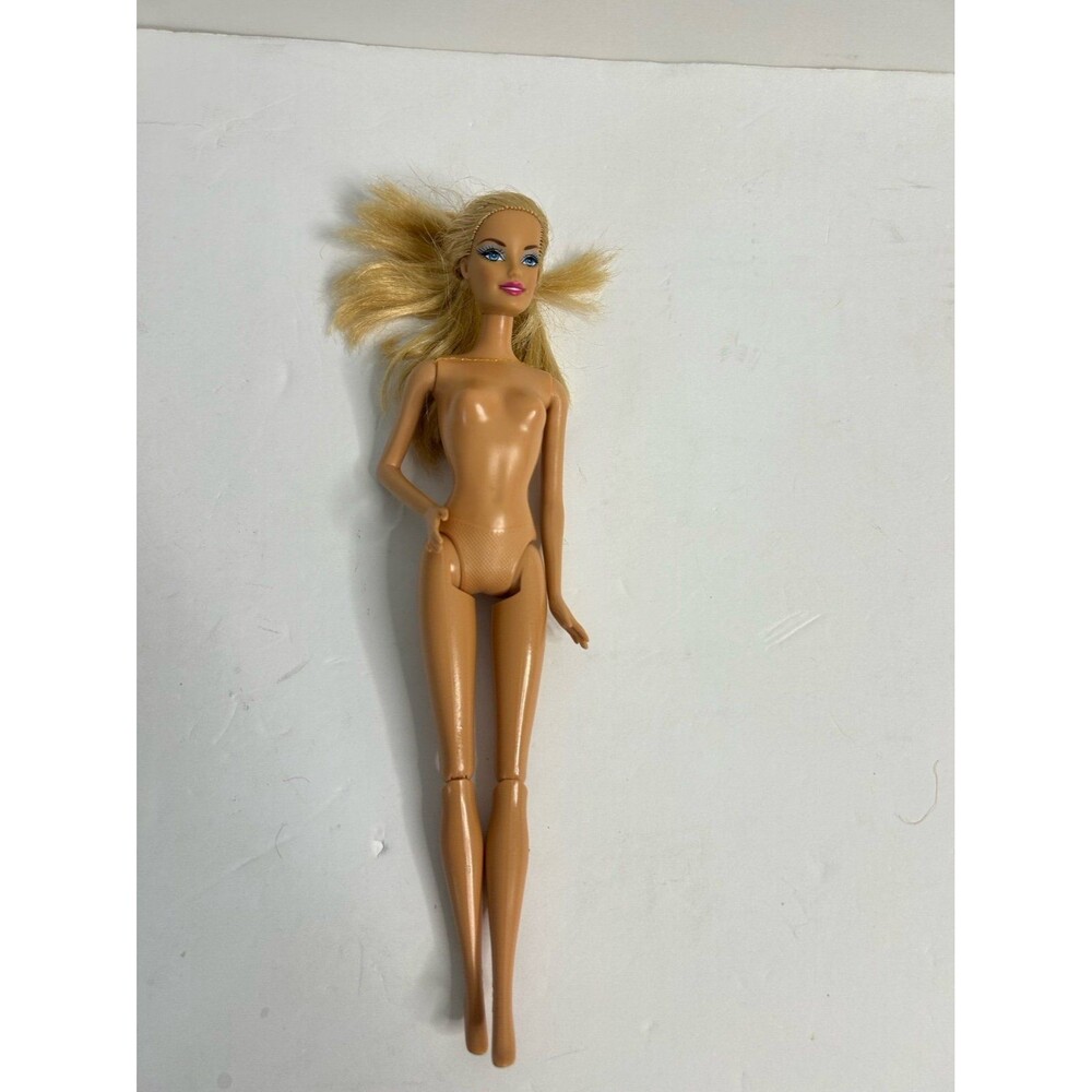 Barbie doll blonde hair blue eyes